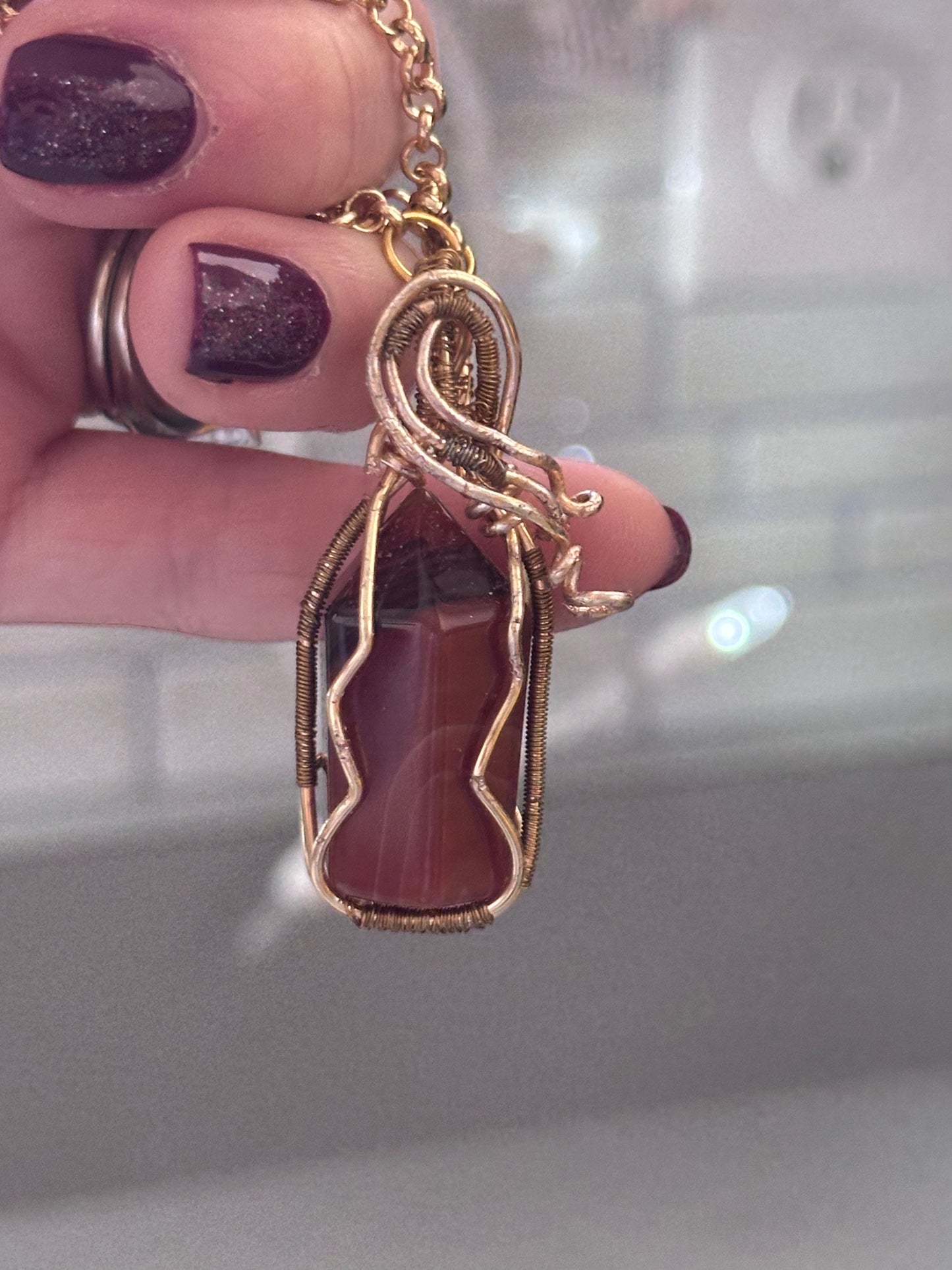 Fancy brown stone necklace