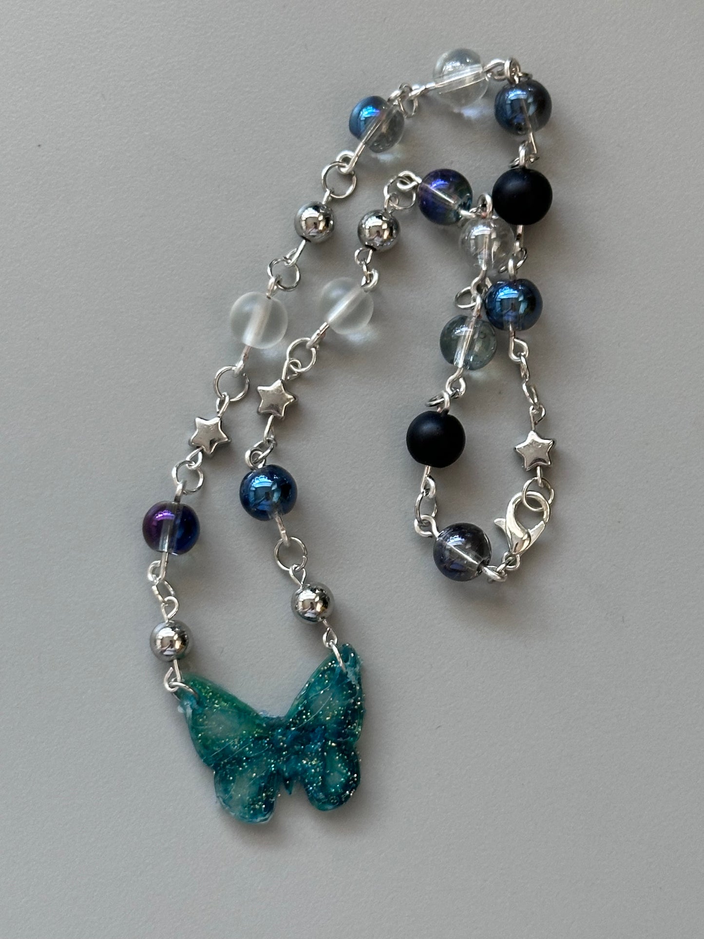 Blue butterfly necklace