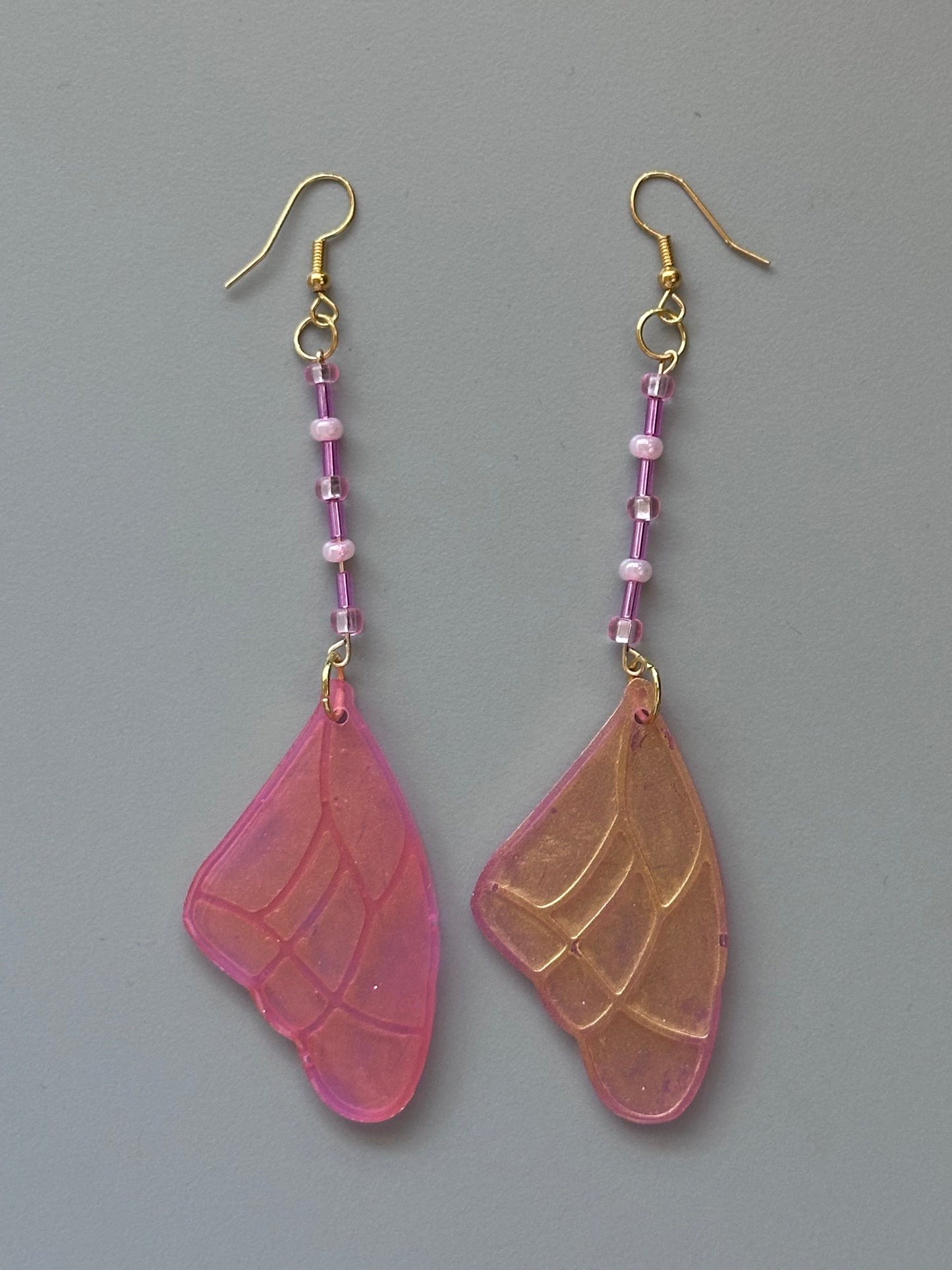Pink wing earrings